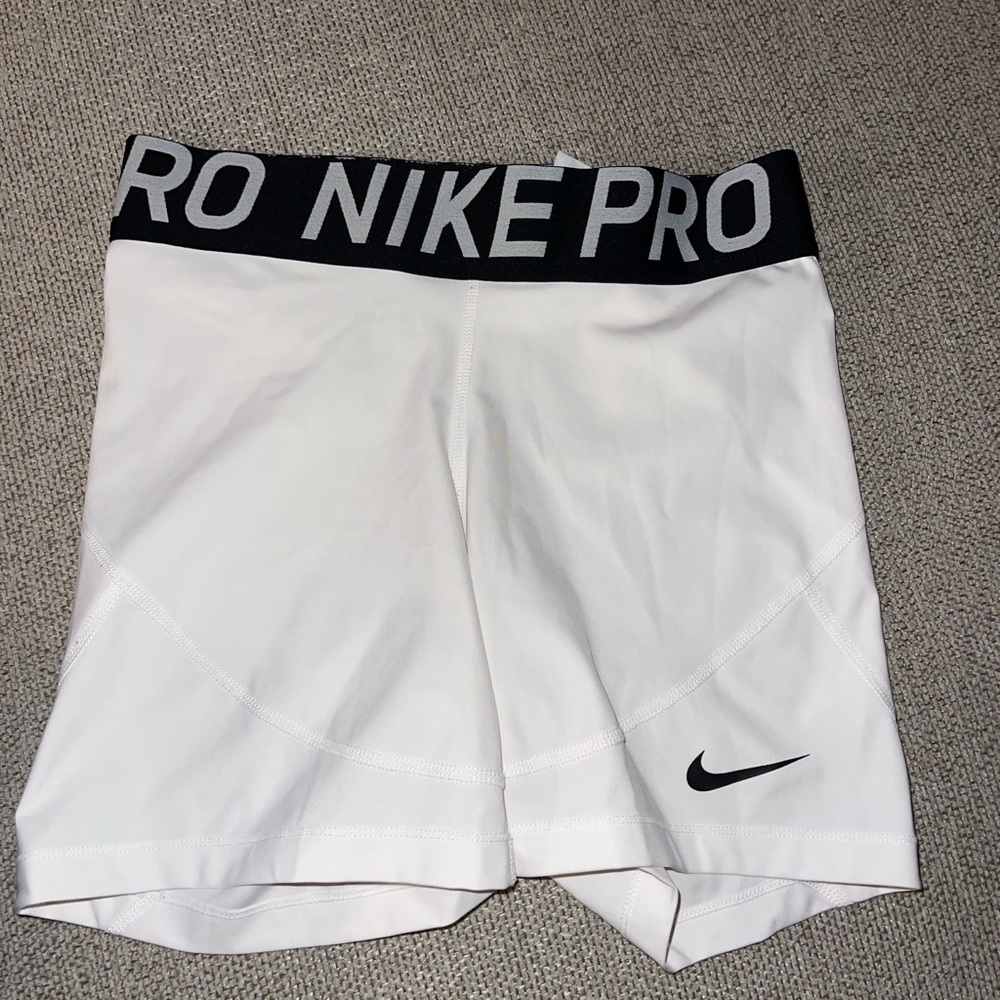 White Nike Pro shorts